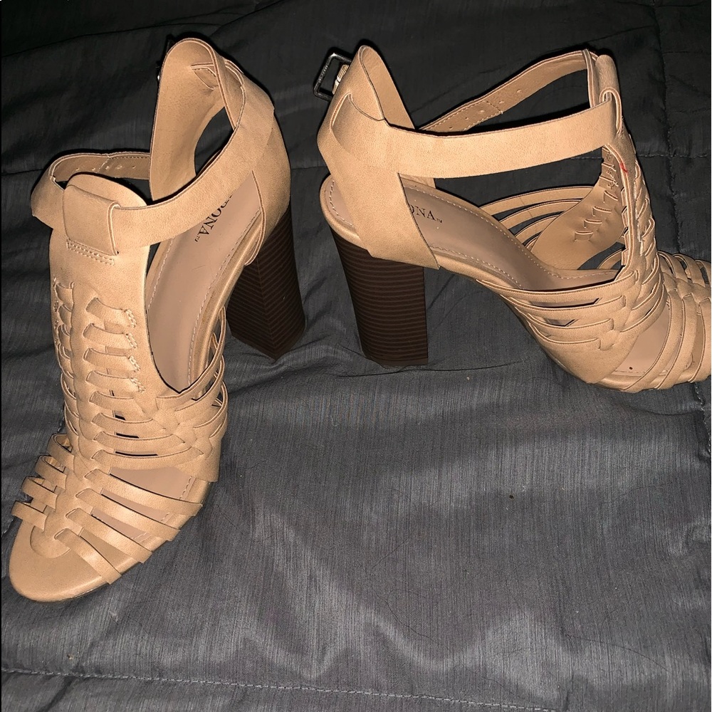 Women’s strappy heels.